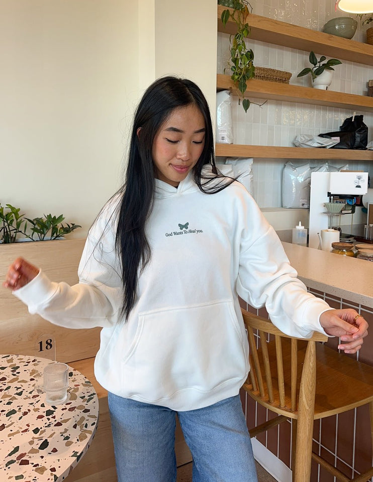 God Heals Unisex Hoodie - Wear with style