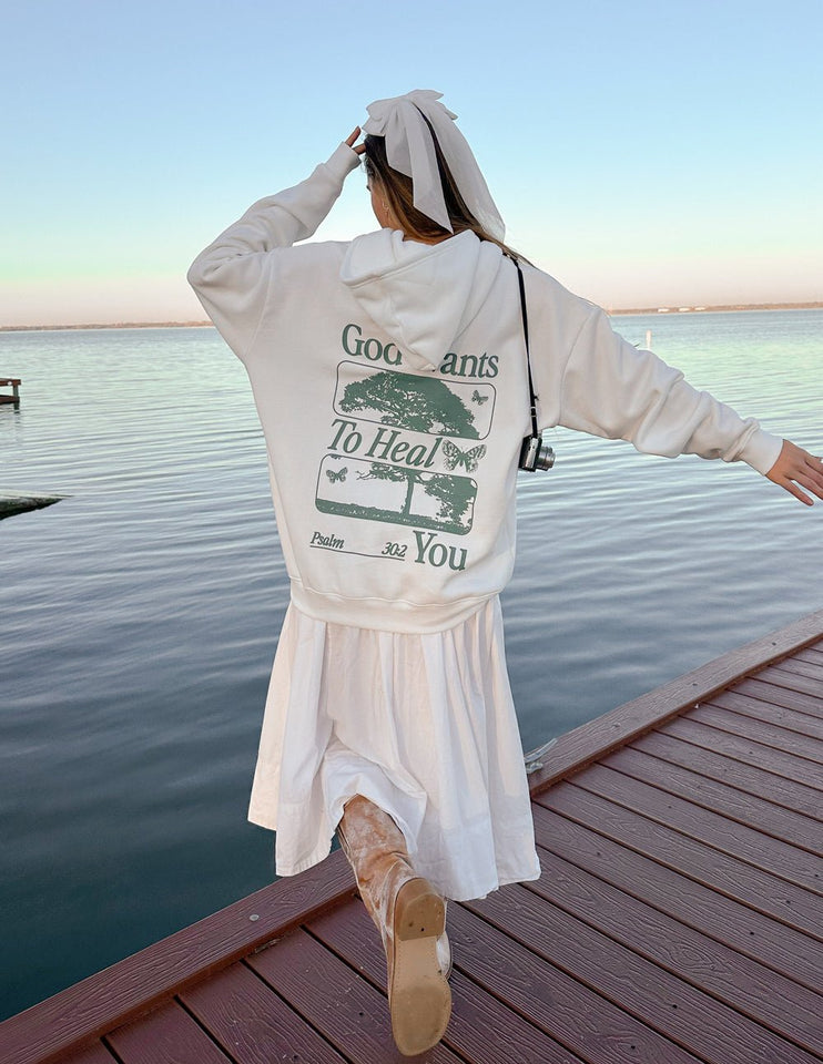 God Heals Unisex Hoodie - Wear with style