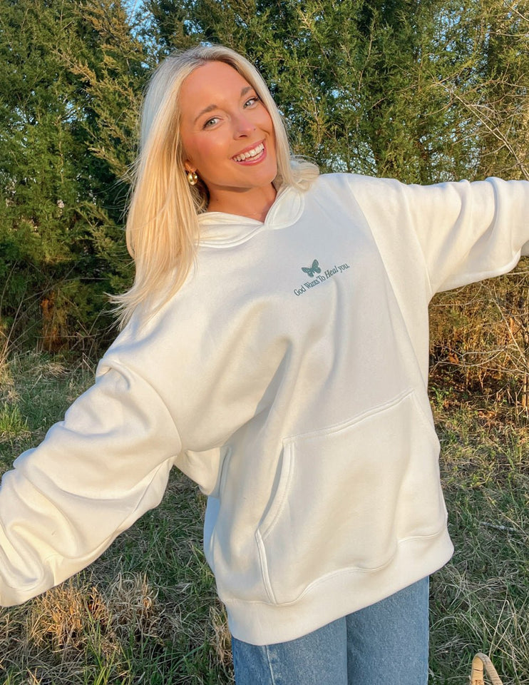 God Heals Unisex Hoodie - Wear with style