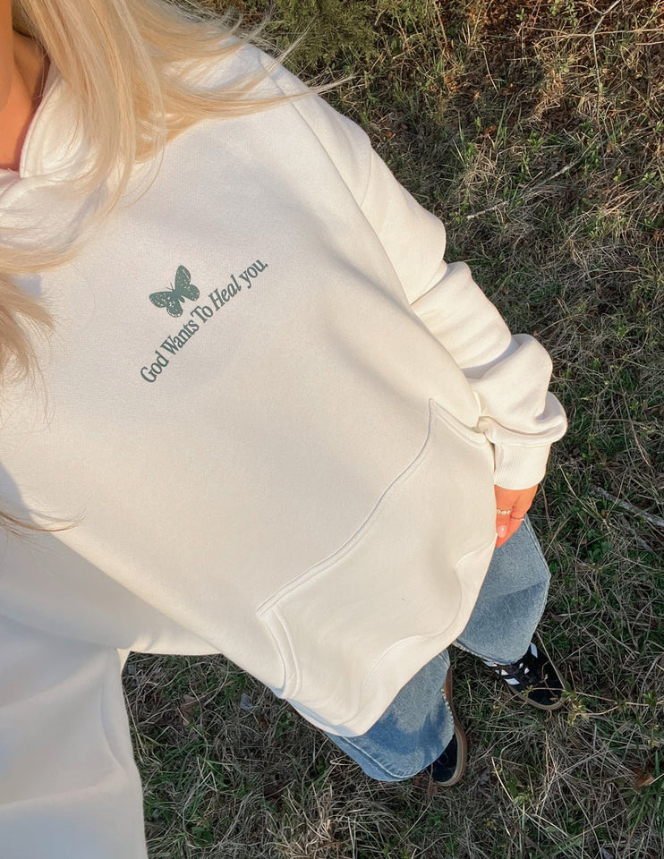 God Heals Unisex Hoodie - Wear with style