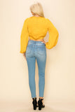 Long sleeve crop top with an open front design - Wear with style