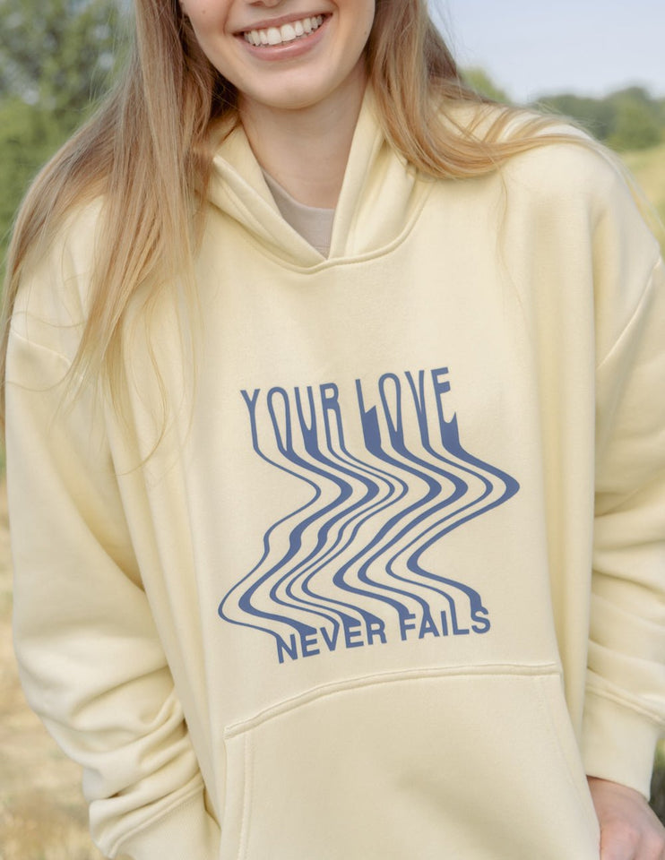 Love Never Fails Cream Unisex Hoodie - Wear with style
