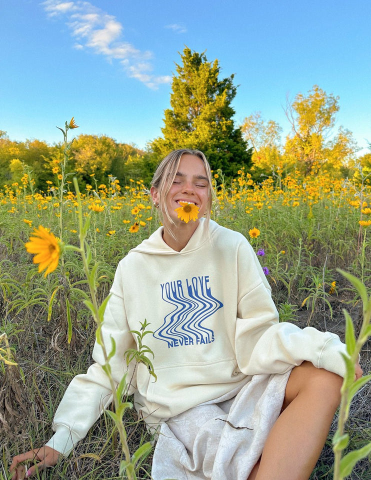 Love Never Fails Cream Unisex Hoodie - Wear with style
