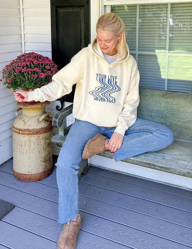 Love Never Fails Cream Unisex Hoodie - Wear with style
