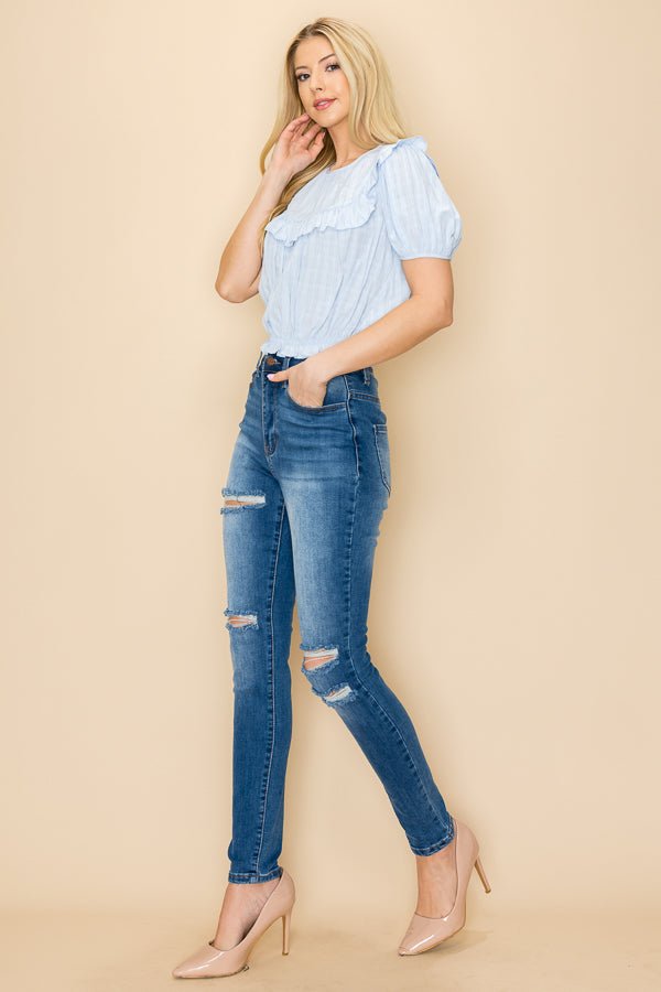Ruffle crop top with puff sleeve and an open back design - Wear with style